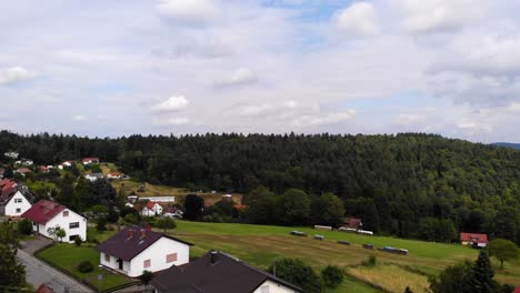 Aerial-flight-of-local-German-houses-closely-in-Wilhelmsfeld,-Germany
