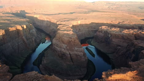 Aerial-Shot-Of-Horseshoe-Bend-And-Colorado-River-At-Sunset,-Arizona
