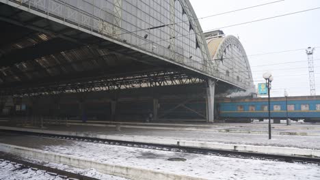View-Of-Train-Station-In-Kyiv,-Ukraine-On-A-Winter-Day---panning-shot
