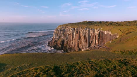 High-cliffs-on-atlantic-ocean-beautiful-aerial-cinematic-view,-Brazilian-Conservation-Unit-located-in-the-southern-region,-State-of-Rio-Grande-do-Sul,-Torres-City