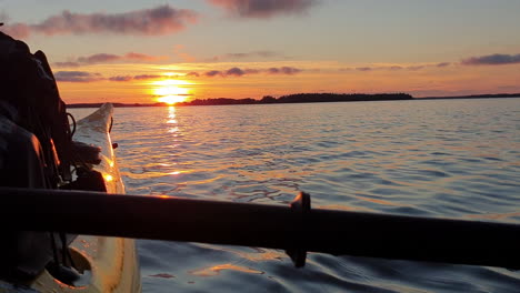 Kayaking-in-Stockholm-archipelago,-magical-summer-sunset