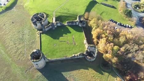 Ancient-Flint-castle-medieval-heritage-military-Welsh-ruins-aerial-view-landmark-birdseye-right-rotate