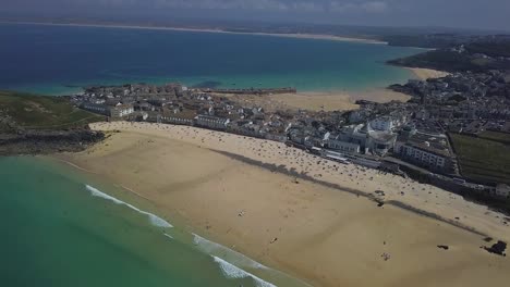 Popular-St-Ives-beaches-in-Cornwall,-UK-summer-holiday,-aerial-view