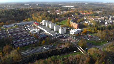 Aerial-view-Bergsjon-suburb-in-Gothenburg-overlooking-Apartment-buildings-in-a-residential-neighborhood,-wide-pull-back-establishing-shot