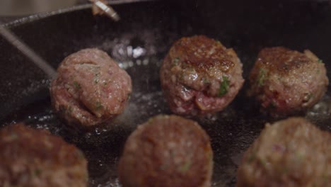 Frying-meat-balls-in-hot-frying-pan