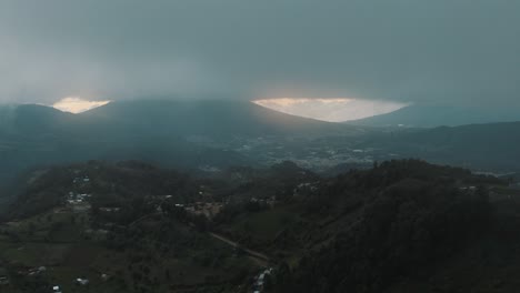 Drone-aerial-view,-high-over-the-mountains-during-cloudy-cold-weather-in-Guatemala