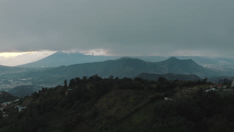 Drone-aerial-high-view-of-beautiful-misty-mountains-and-volcanic-landscapes-in-Guatemala