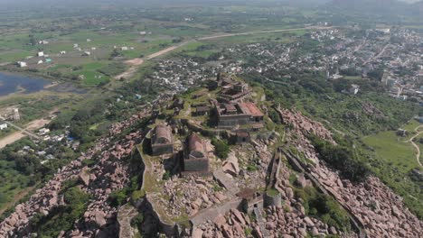 Slow-aerial-forward-shot-showing-Krishnagiri-Fort-complex-build-on-top-of-mountain