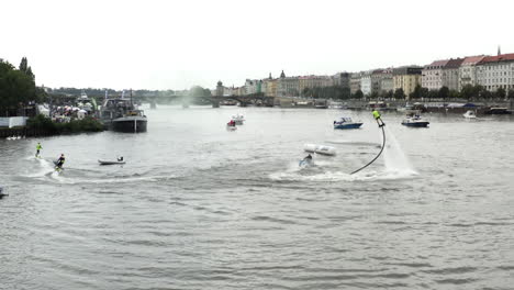 Aerial-shot-of-jet-surfing-and-other-water-sports-in-Prague,-Czech-Rep
