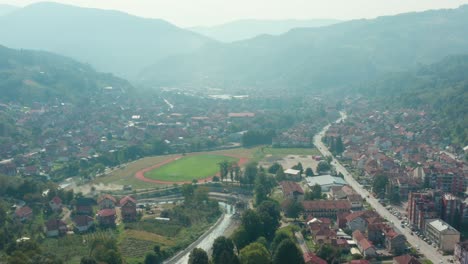 Ivanjica-mountain-town-in-Serbia,-aerial-view-over-scenic-Moravica-river-valley