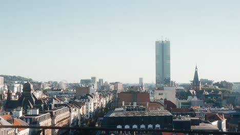 View-from-a-rooftop-over-the-Skyline-of-Brussels-around-the-Brussels-South-Station-area,-better-known-as-the-Tour-du-Midi-Bruxelles