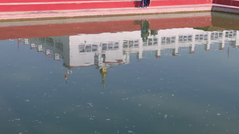 Holy-Temple-in-Lumbini-reflected-in-the-holy-pond