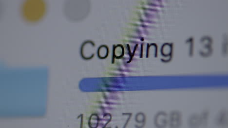 Closeup-of-progress-bar-copying-data-with-number-of-GB's-being-copied-with-slow-push-forward