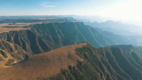 Aerial-cinematic-establishing-shot-of-brazilian-rainforest-plateau-canyons-and-mountains-at-sunny-day