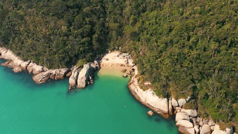 Sunny-tropical-beach-aerial-view-located-in-Santa-Catarina,-Brazil