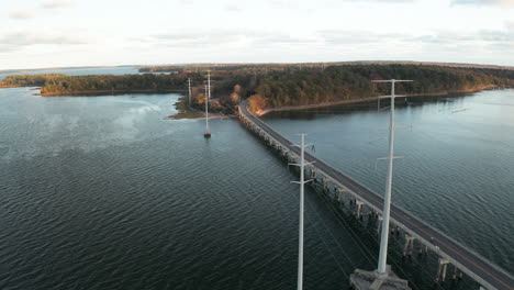Drone-Fly-over-power-lines-footage-at-Cousins-Island-Bridge-in-Yarmouth,-Maine,-USA