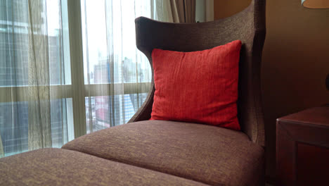 pillow-on-sofa-bed-near-window