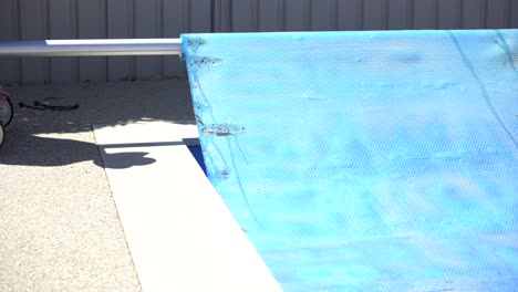 Taking-Pool-Cover-Off-Sunny