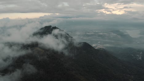 Drone-aerial-flying-high-over-cloudy-misty-mountains-in-Guatemala