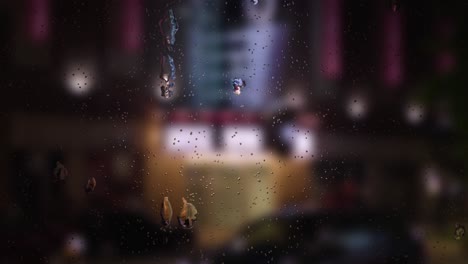 raindrop-on-windows,-blur-the-night-background-in-the-middle-of-the-city