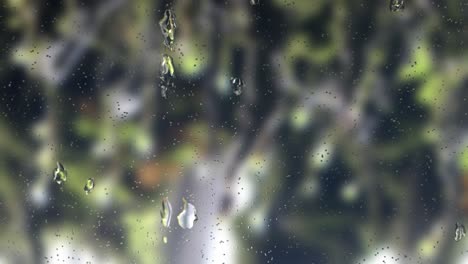 Regentropfen-Auf-Fenstern,-Mit-Wassertropfen-Unschärfehintergrund
