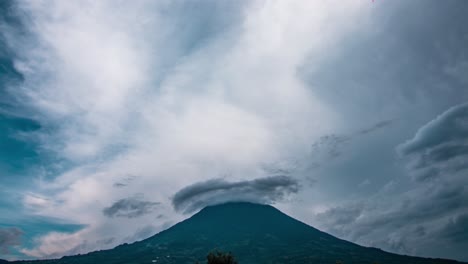 Wide-timelapse-of-agua-volcano-during-cloudy-day-shot-in-Antigua-Guatemala