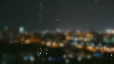 Regentropfen-Auf-Fenstern-Mit-Unscharfem-Hintergrund,-Nachtansicht-Der-Stadt