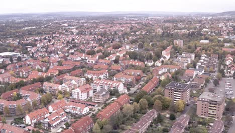 Drone-circling-over-the-roofs-of-Goettingen-Südstadt-and-reinhaeuser-landstraße-captured-by-a-drone-aerial-shot-in-late-autumn