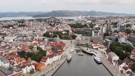 Downtown-Stavanger-City,-Norway,-Cruise-Ship-Harbor-and-Valberget-Hill,-Aerial-View-of-Cityscape-Skyline