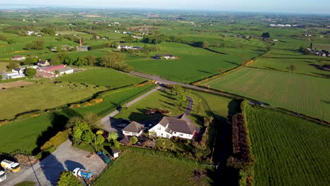 Lowering-drone-shot-of-farmland-in-Ireland
