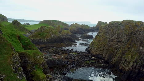 Amazing-revealing-aerial-view-of-rocky-coastline-in-northern-Ireland