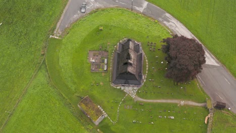 Aerial-View,-Hopperstad-Stave-Church-and-Graveyard,-Norway
