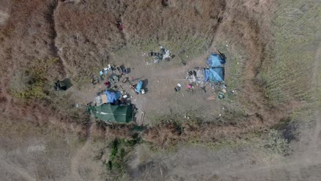 Aerial-view-of-Homeless-Camp-in-the-middle-of-a-field