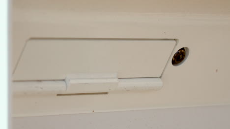 White-Mail-Slot-for-Letters-and-Envelopes-With-Lock-Close-Up