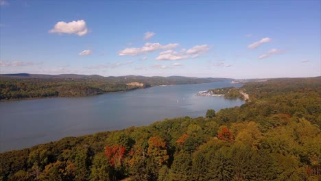Aerial-video-of-the-Hudson-River-in-early-autumn-near-Wappingers-Falls,-New-York-and-New-Hamburgh-and-Poughkeepsie
