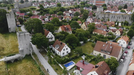 Visby-City-with-UNESCO-Wall,-red-roof-houses-and-small-streets,-Travel-Destination,-Aerial