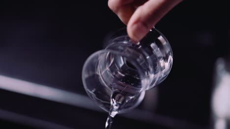 Pouring-Water-From-A-Glass-Beaker