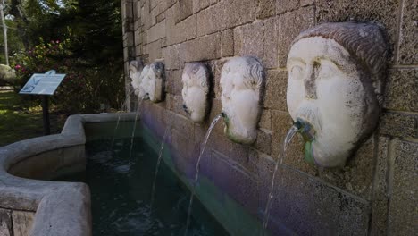 Replica-of-Spanish-water-fountain-with-face-spouts-in-St