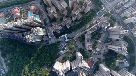Central-Hong-Kong,-top-down-aerial-view-of-traffic-and-city-skyscrapers