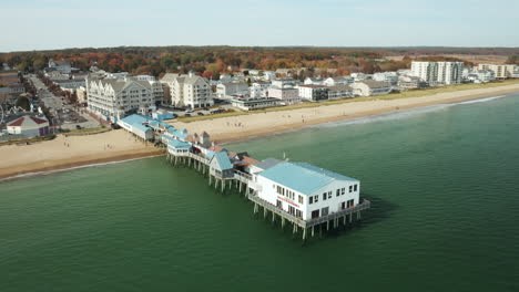 Aerial-drone-shot-of-Old-Orchard-Beach-Maine-Pier-and-town-in-fall