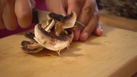 Mushroom-caps-sliced-on-a-cutting-board