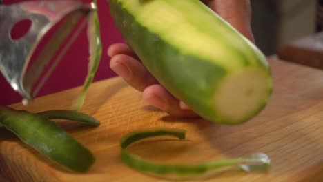 Peeling-a-cucumber-with-a-peeler