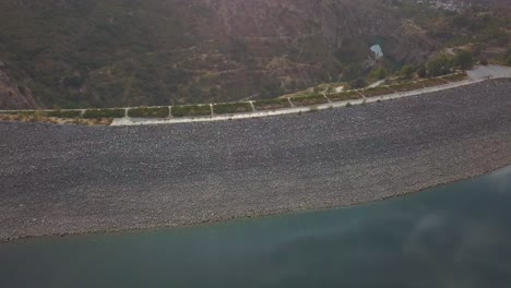 Aerial-view-of-the-wall-of-a-dam-in-the-south-of-Spain