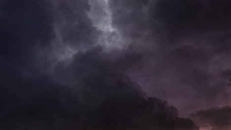 a-thunderstorm-timelapse-with-a-flash-in-the-dark-cloudy-sky
