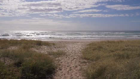 Sandy-walkway-to-the-waves--Lennox-Point-NSW-Australia--Wide