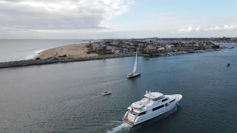 yacht-entering-beautiful-marina-in-california