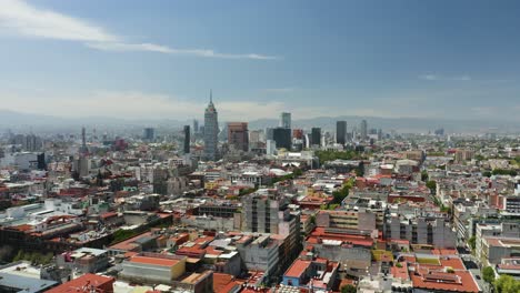 Drone-Flies-towards-Torre-Latinoamericana,-Mexico-City's-Historic-District,-Day