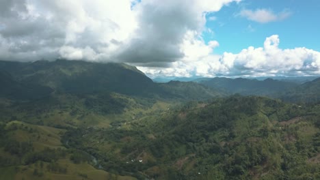 Drone-aerial-landscape-view-of-green-mountains-during-a-beautiful-day-in-Guatemala