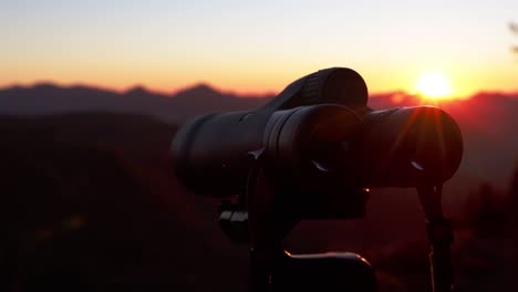 Epic-Sunset-pan-with-binoculars-and-mountain-wilderness