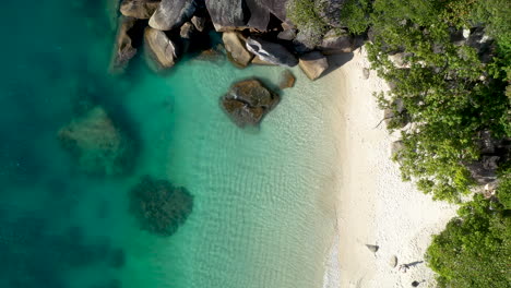 Rising-drone-shot-of-clear-ocean-water-at-Fitzroy-Island-Australia